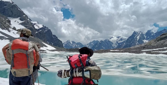 Looking over glacier to mountains Laspur Trek