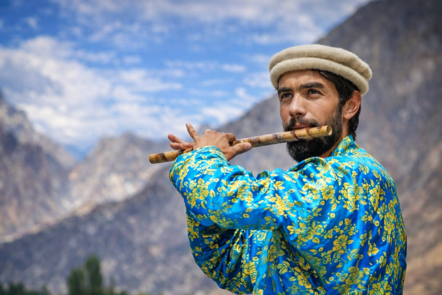 Chitral Gilgit Baltistan mountains man flute music