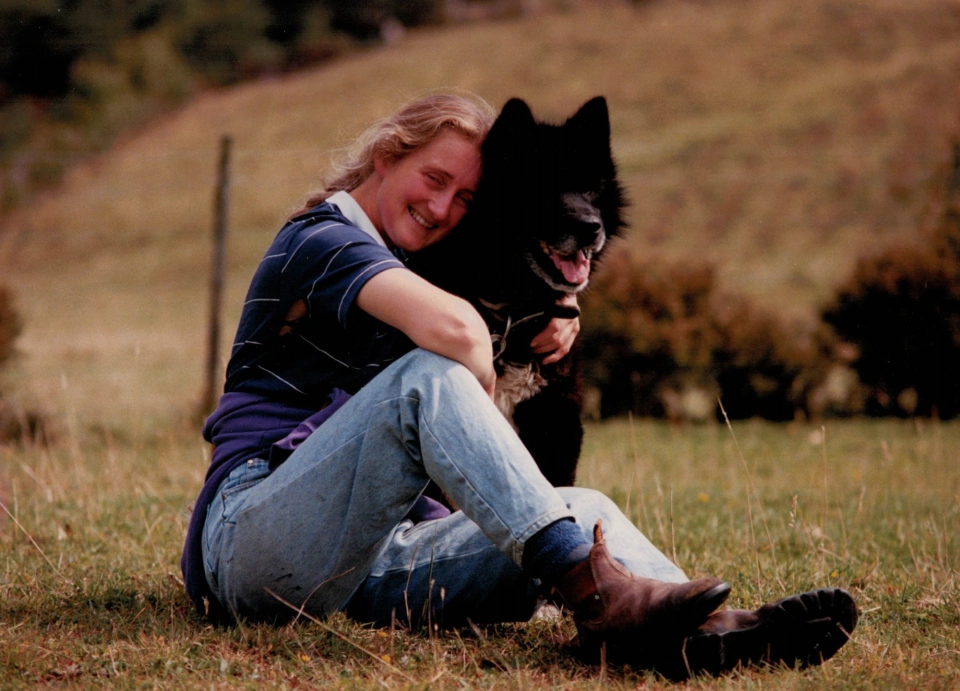 Tonia Cochran with husky on Bruny